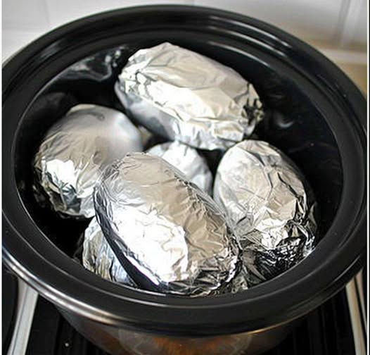 Wrap potatoes in tin foil and put in crock pot. Enjoy this lip-smacking result
