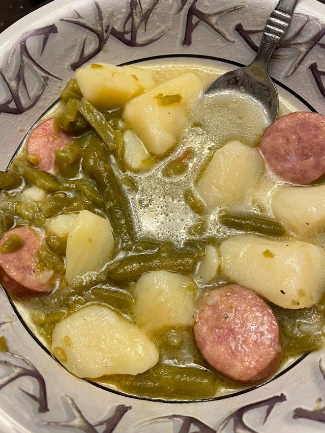 Green beans and potatoes with polish sausage cooked with chicken broth