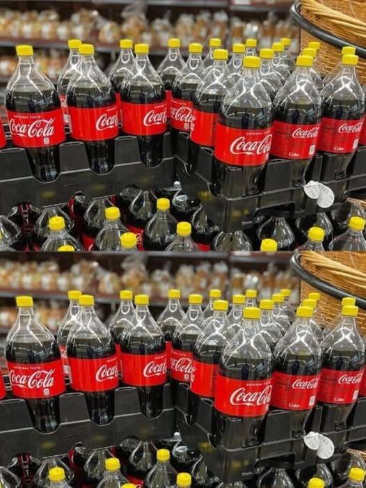 I overheard a woman in the store asking for yellow cap Coca-Colas, saying she would NEVER buy the ones with red caps. What does it mean? She already seemed angry, and I didn’t want to ask her!